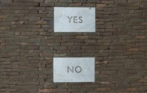 yes and no slabs on brick wall