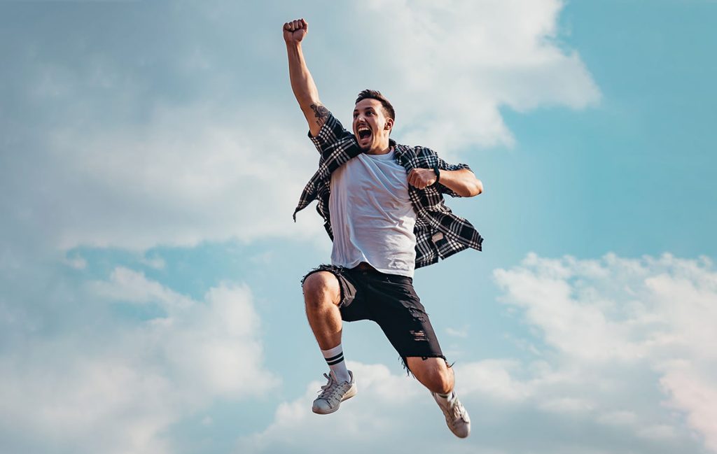 man jumping for joy