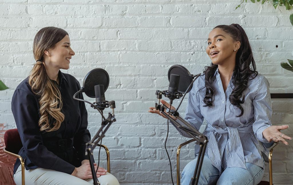 two women podcasting